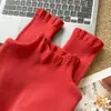 Suéter de punto con volantes para mujer al por mayor transfronterizo, camiseta base de punto, nuevo top de color liso 2026 otoño e invierno, ajuste ceñido y favorecedor
