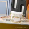 Bolso de Cuero Genuino Transfronterizo para Mujer, Nuevo Estilo Bolso de Cintura Estampado en Relieve, Bolso Silla de Montar, Bolso Cruzado de Gama Alta de Nicho, Bolso Versátil con Cadena