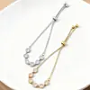 Cdd Nuevo Cobre Incrustado Circonio Lujo Accesible Gama Alta Calado Trébol de Cuatro Hojas Elegante Pulsera Ajustable Deslizante Fábrica de Origen