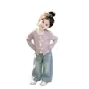 Elegante top de manga larga para bebé niña para primavera y otoño con corbata de lazo y diseño de lunares en contraste