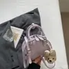 Bolsa de Bowling Feminina 2026 Nova Alta Aparência Cor Azul Claro Color Block Bolsa de Mão Moda Bolsa de Ombro Único Bolsa Transversal para o Trabalho