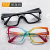 Gafas lisas de ojo de gato irregulares marco de resorte de PC anti luz azul color caramelo marco de gafas ópticas europeo y americano femenino