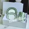 Taza de Café y Platillo de Porcelana Fina Estilo Europeo Transfronterizo Taza de Cerámica D Hogar Patrón de Cuadrícula Simple Juego para el Hogar Taza para el Té de la Tarde