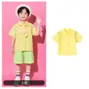 Jardín de Infancia 1 de Junio Día del Niño Porra Coro Disfraz de Presentación Escuela Primaria Reunión Deportiva Camisa Amarilla Disfraz de Presentación