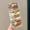 Nuevas diademas de alta gama 2026 para mujer, ligas de goma, cordones para el pelo, anillos para el pelo, cubiertas de cuero, accesorios para el pelo de niña con un toque de sofisticación
