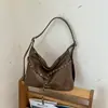 Bolso de hombro minimalista estilo coreano transfronterizo para mujer, nuevo diseño de nicho vintage 2026, bolsa de mano de gran capacidad para el día a día