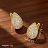 Pendientes de Yanbo e-commerce transfronterizo más vendidos estilo europeo y americano con diamantes completos e incrustaciones de cobre en zirconia cúbica para mujer, clips para orejas en forma de lágrima tono dorado, pendientes de lujo ligero