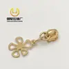 Fabricantes en stock nuevos accesorios para bolsos de mujer tirador cabeza ropa casual universal forma de flor dorada tirador cabeza diy