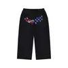 Calça de moletom preta Y2K de alta qualidade com estampa de estrela de strass e detalhes de letras brilhantes vermelhas e azuis, cintura elástica, corte solto, calça pantalona de comprimento total.