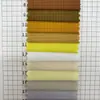 En stock, tela a cuadros blanca de nailon-poliéster de 0,25 denier, suave y amigable con la piel, tela a cuadros teñida de nailon clásica y moderna para pantalones