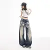 Calça jeans larga de cor laranja jovem # com design desgastado inspirado em vintage, corte solto, efeito emagrecedor, estilo único, versátil e moderna