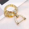 Hebilla Creativa de Estribo Anillo de Llavero de Diamante Accesorios Metálicos para Llaves Anillo de Resorte Herrajes para Bolsos Colgante Regalo Venta al por Mayor