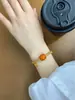 Pulseira de cera de abelha amarela caramelo de segunda geração, pulseira com pingente de palavra Jinle em areia dourada, pulseira elástica, presente para mulheres