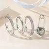 Anillo de Luz de Zirconia Incrustada en Oro Real Chapado en Cobre Transfronterizo Europeo y Americano Lujo Ligero Sensación de Alta Gama Anillo para el Dedo Joyería de Mano Versátil Fabricante Venta al por Mayor en Stock