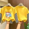 Camiseta de manga larga a rayas de algodón puro para niñas, colección primavera/otoño 2026, estilo nuevo, diseño de caricatura lindo, capa base versátil y a la moda