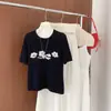 Verão Novo Estilo Americano Color Block Estilo College Desenho Animado Malha Pura de Algodão Top para Mulheres, Gola Redonda, Ombro Normal, Manga Curta Camiseta Atacado