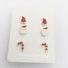 Set de aretes de Navidad nueva combinación Gorro de Navidad hombre mayor muletas Barra aleación aretes de tendencia fabricantes transfronterizos