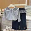 Nuevo conjunto de encaje de dibujos animados de otoño para niñas, ropa infantil versátil, estilo casual y moderno para bebés, ropa infantil de moda
