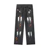 Jeans Masculino Retro Americano de Primavera e Outono com Temperamento Graffiti Marca da Moda Novo Design Calças de Perna Larga Soltas Emagrecedoras com Manchas de Tinta