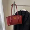 Bolso de axila retro francés transfronterizo para mujer, nuevo bolso de hombro de nicho de moda 2026, bolso versátil de gran capacidad para el día a día