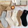 Calcetines de rizo para mujer para otoño e invierno, forrados de felpa y engrosados, lindos calcetines holgados de media pantorrilla, calcetines cálidos para maternidad con bordado de corazón