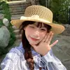 Sombrero de paja de ala plana con lazo calado estilo francés para mujer, elegante sombrero de verano para la costa y la playa, sombrero para el sol con protección solar