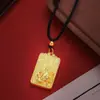 Nuevo colgante tradicional estilo chino de loto de la paz cepillado con acabado en oro mate, collar para transmisión en vivo al por mayor, diseño de colgante cuadrado