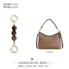 Solo se vende la bolsa interior - La bolsa exterior no está incluidaCoac Coach H-Chi Bolso Hobo 31 Tamaño Mediano Laurel19 Papel Tyvek 36