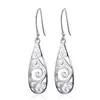 AliExpress Pendientes de patrón hueco calientes de comercio exterior europeo y americano pendientes de amor huecos simples tallados retro al por mayor