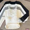 Camiseta de manga larga con base Pure Desire para otoño e invierno, con almohadillas para el pecho para mujer, diseño de costura de encaje sexy, top interior ajustado