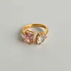 Anillo Dazan al por mayor en stock de Acero de Titanio con Galvanizado de Oro Real 18K, Cuadrado de Gota de Agua Abierto con Circonita, Transfronterizo Europeo y Americano Ins