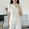 Nuevo estilo de verano, algodón puro, manga corta, tejido de seis botones, retro, trenzado, medio abierto, cuello redondo, suéter, top simple y fino para mujer