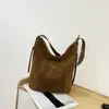 2026 Nuevo Bolso Cubo de Piel de Vaca Mate Ante Retro Gran Capacidad para Viajar al Trabajo Hombro Único Cruzado Bolso Tote de Gama Alta