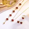Set de trébol de cuatro hojas de acero de titanio de doble cara transfronterizo de Amazon: pulsera, collar, pendientes, anillo, juego de cuatro piezas, joyería que no se decolora