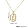 Distrito Lu nuevo collar con colgante ovalado hueco bañado en cobre 26 letras cadena para suéter de temperamento simple versátil accesorios