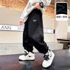 Pantalones deportivos casuales de invierno grises para niños 2025 Nuevos pantalones holgados gruesos de otoño e invierno para niños