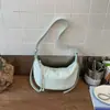 Bolsa Nicho de Moda Transfronteiriça em Formato de Chifre 2026 Nova Bolsa Transversal Casual Versátil Bolsa de Ombro Feminina Bolsa de Axila Bolsa Dumpling