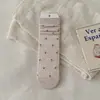 Calcetines florales pequeños y delicados estilo francés de algodón puro de media pantorrilla, estilo nuevo de Instagram, calcetines versátiles holgados, calcetines largos
