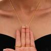 Collar con colgante móvil de circonita de tres diamantes nueva Xinyixin transfronteriza Acero inoxidable Nicho Anillo abierto Juego para mujer
