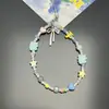 Ins Dulce Fresco Cadena para Teléfono Móvil Corta Nicho Amarillo Gatito Correa Colgante Cámara CCD Funda para Teléfono Móvil Universal Femenina Nuevo Estilo