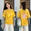 Camiseta de manga larga tipo dos piezas de imitación para niños, colección otoño 2026, para niñas, 100% algodón, cuello redondo, corte holgado, diseño lindo de caricatura, top básico