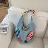 Bolsa de Tricô Transfronteiriça para Mulheres, Nova Versátil Estilo Preguiçoso Primavera/Verão 2026 Bolsa de Ombro, Bolsa Tote de Grande Capacidade