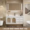 Gabinete de baño de estilo lujo ligero, minimalista y rústico, una combinación de madera maciza para uso doméstico, con un lavabo cerámico integrado para lavarse las manos y la cara