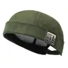 Sombrero de piel de melón sin ala con etiqueta de tela de nuevo estilo para primavera y otoño, para hombres y mujeres, estilo hip-hop coreano, estilo callejero, estilo retro