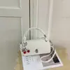 Bolso Cuadrado Pequeño de Mano con Hebilla Estilo Coreano Lujo Ligero para Mujer 2026 Nuevo Bolso Cruzado Simple Versátil Bolso de Hombro Único para el Trabajo