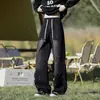 Jeans negros con salpicaduras de pintura para hombre, primavera y otoño, estilo retro japonés, holgados casuales, lavados y desgastados, elegantes pantalones largos de pierna recta