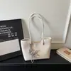 Bolsa Casual da Moda com Personalidade de Grande Capacidade Textura Simples Bolsa de Ombro Feminina 2026 Nova Coleção de Primavera Bolsa Tote