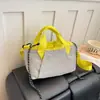 Bolsa de Lona Nueva Otoño 2026 Moda para Viajes Bolso de Mano Simple Moderno Toque de Lujo Bolso de Hombro Único para Mujer