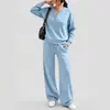 Conjunto deportivo casual de dos piezas para mujer, otoño e invierno 2026, transfronterizo europeo y americano, nuevo diseño de moda, top holgado de manga larga y pantalón de pierna ancha