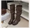 Botas de mujer estilo western retro francés desgastado con tacón grueso, nuevas 2026 versátiles de caña alta apiladas tipo montar para mujer, venta al por mayor